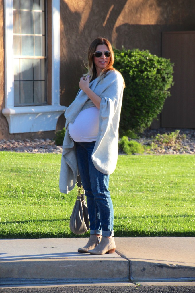 grey cuyana cape with a baby bump